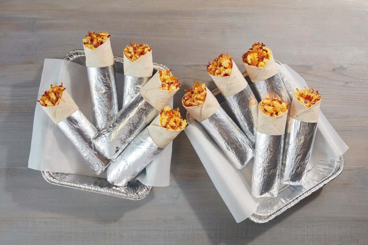 IHOP breakfast burritos on catering trays
